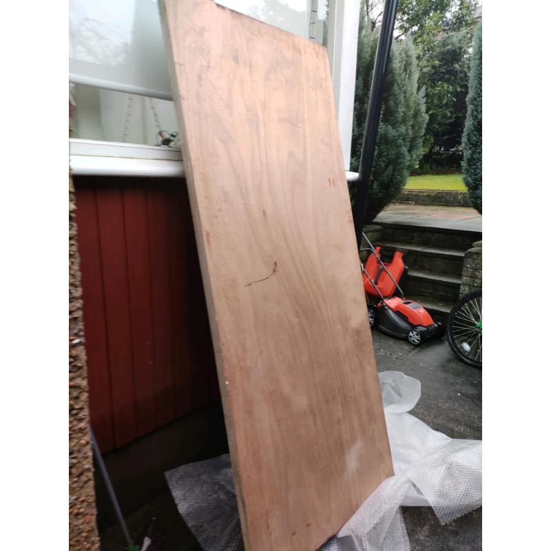 Solid wood storm door.