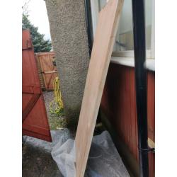 Solid wood storm door.