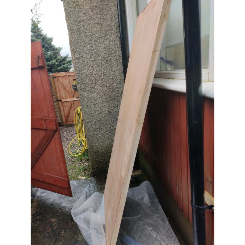 Solid wood storm door.