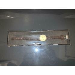 Watch in box brand new