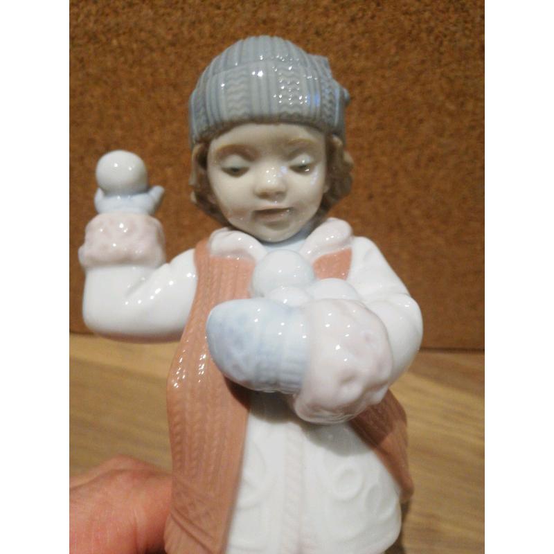 Nao / Lladro boy throwing snowballs figurine