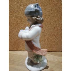 Nao / Lladro boy throwing snowballs figurine