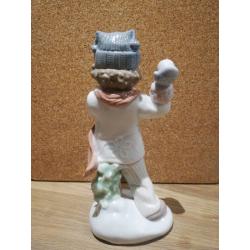 Nao / Lladro boy throwing snowballs figurine