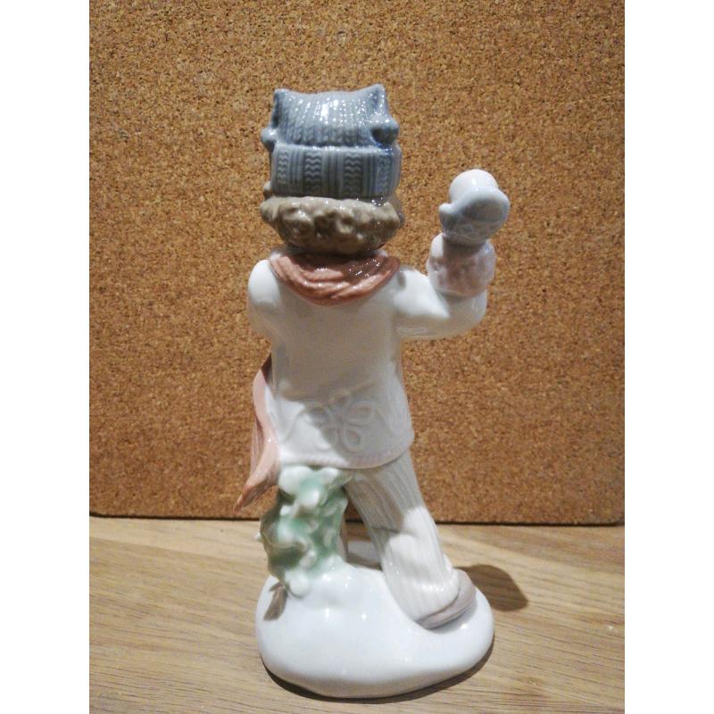 Nao / Lladro boy throwing snowballs figurine