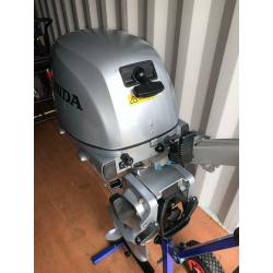 Honda 8hp outboard.