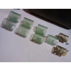 9 Open End Swimfeeders + 4 Surface Controller Floats + 25 end caps.
