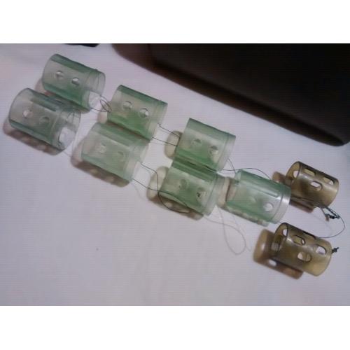 9 Open End Swimfeeders + 4 Surface Controller Floats + 25 end caps.