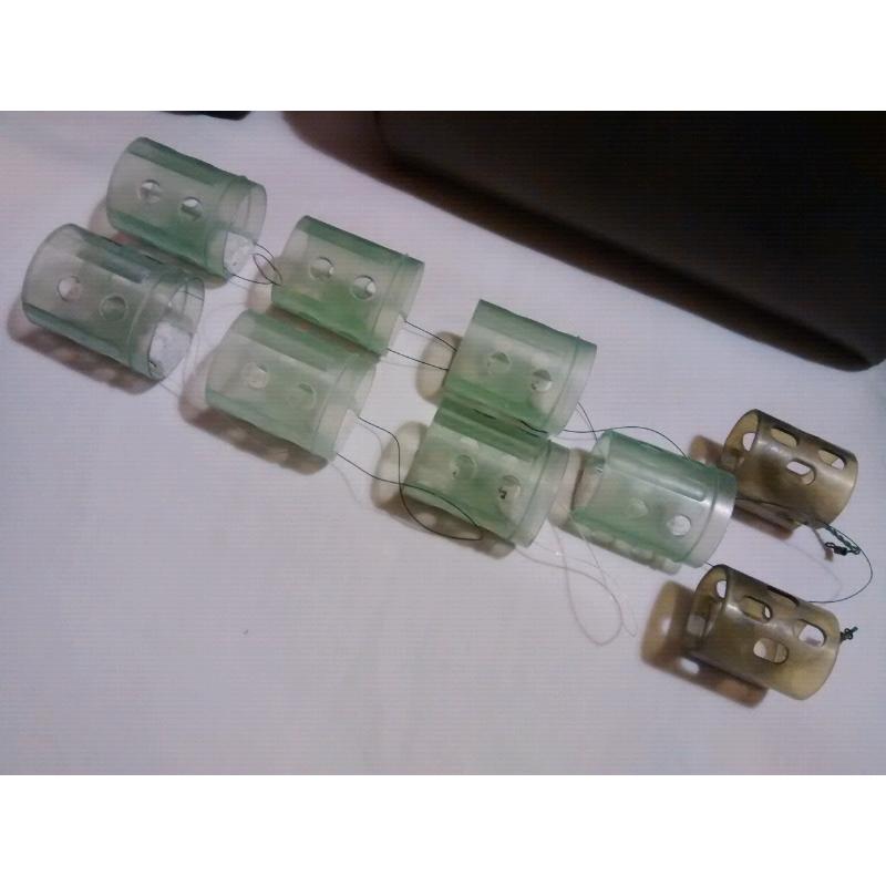 9 Open End Swimfeeders + 4 Surface Controller Floats + 25 end caps.