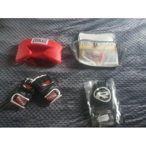 Unused RDA mma gloves and everlast adult headguard