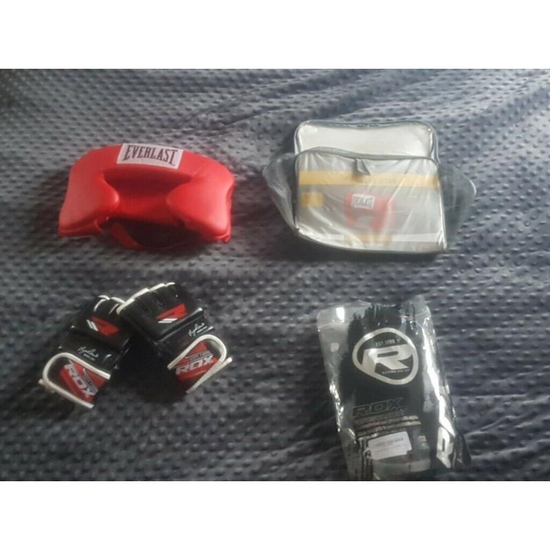 Unused RDA mma gloves and everlast adult headguard