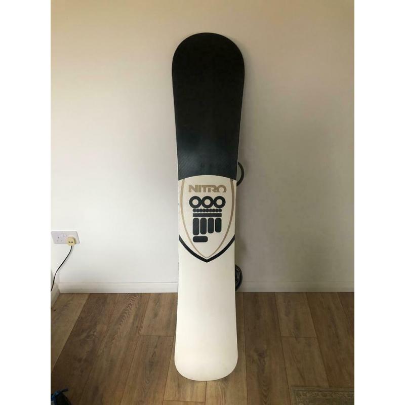 *PRICE DROP* Snowboard with bindings and travel bag