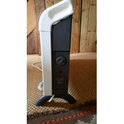 Three Dimplex DXC30 portable electric heaters. ?30 each.