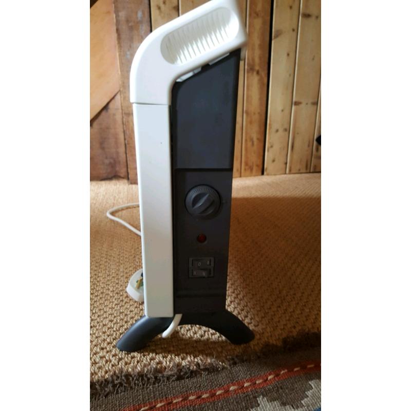 Three Dimplex DXC30 portable electric heaters. ?30 each.