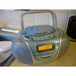 beautiful quality panasonic digital three in one portable audio system,cd,cassette & radio..
