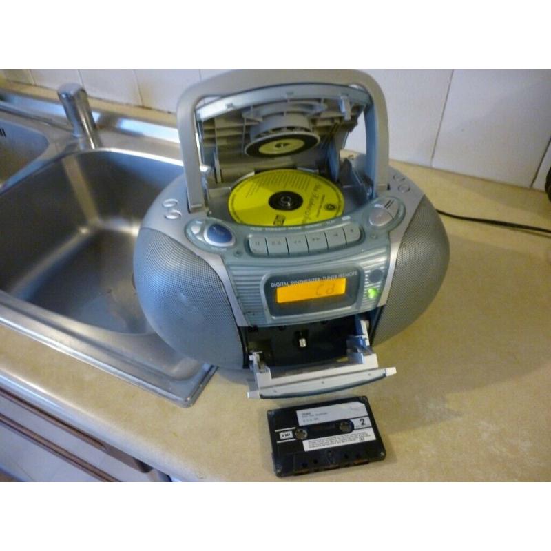beautiful quality panasonic digital three in one portable audio system,cd,cassette & radio..