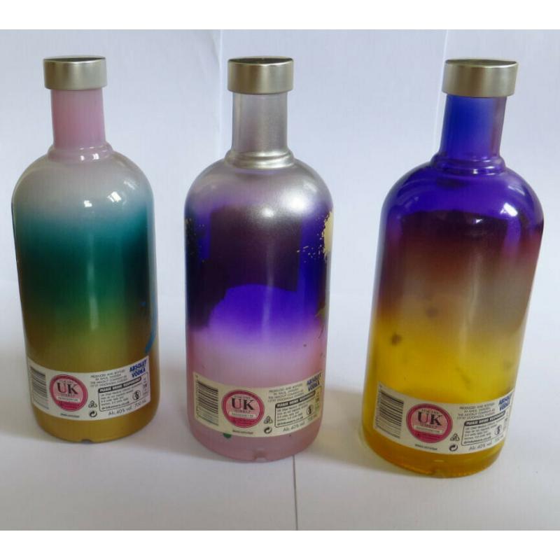 3 Absolut Vodka Unique bottles (empty)