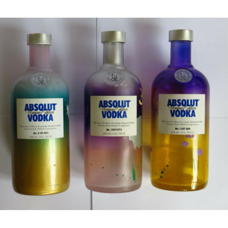 3 Absolut Vodka Unique bottles (empty)