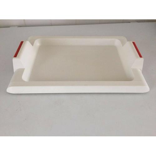 plastic white with red on the 2 handle tray