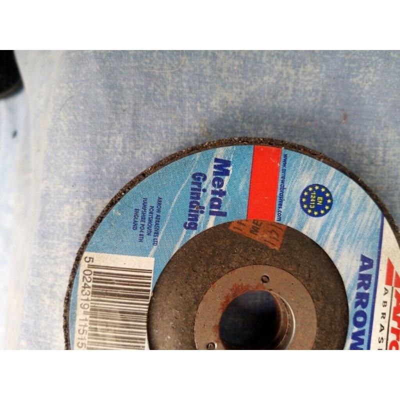 Metal grinding disc 4 & 1/2 inches diameter, 7/8 bore, 1/4 thick.