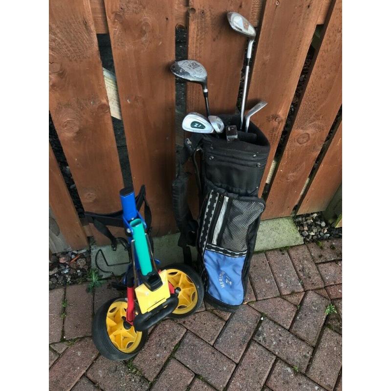 Children?s golf clubs and trolley